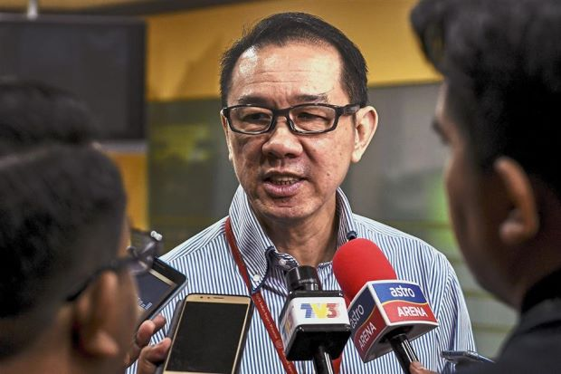 马来西亚羽毛球协会的秘书长拿督黄进财