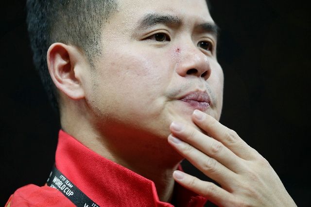 资料图,乒乓球团体赛男子小组赛,中国男队教练刘国正在比赛中观战。 发(蒂姆·爱尔兰摄)
