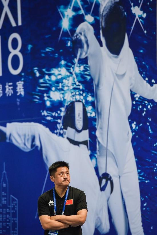 王海滨观战,记者李博摄